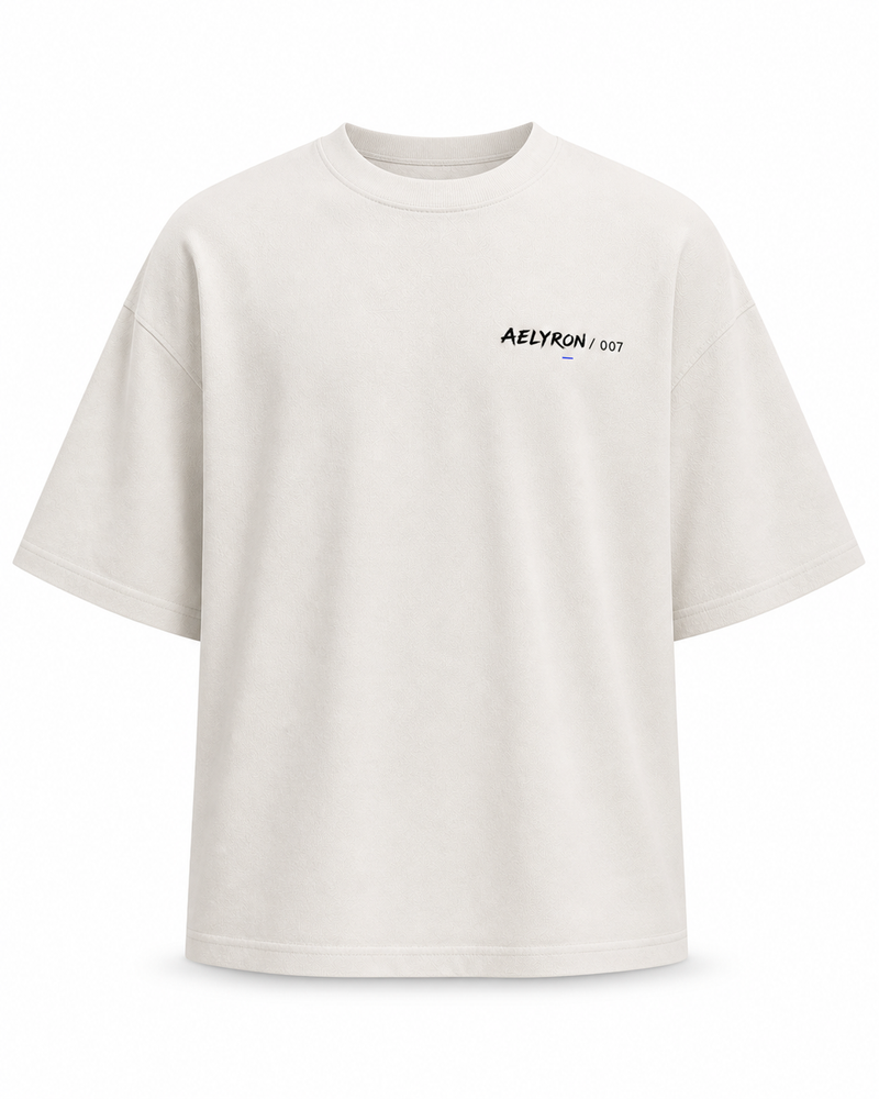 FIERTÉ 007 — vue de face du t-shirt oversize graphique AELYRON