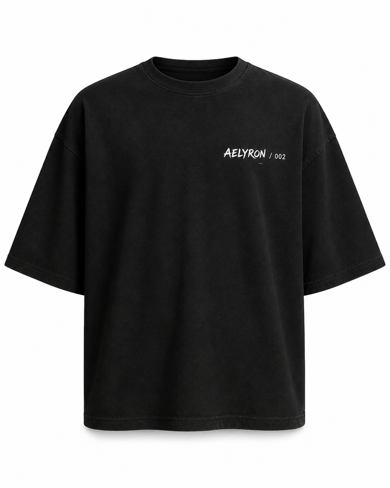 RAGE 002 — vue de face du t-shirt oversize graphique AELYRON
