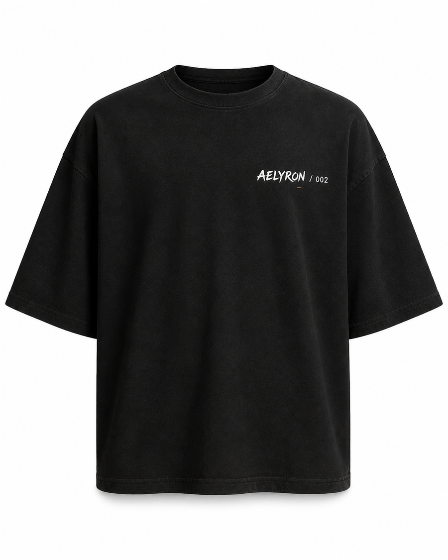 RAGE 002 — vue de face du t-shirt oversize graphique AELYRON
